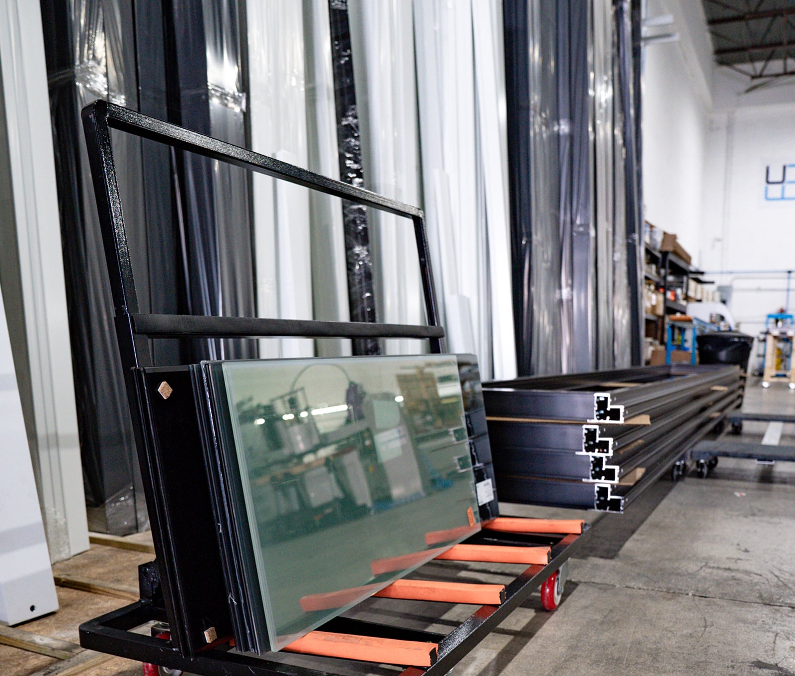 Commercial building with black-framed full-view glass doors